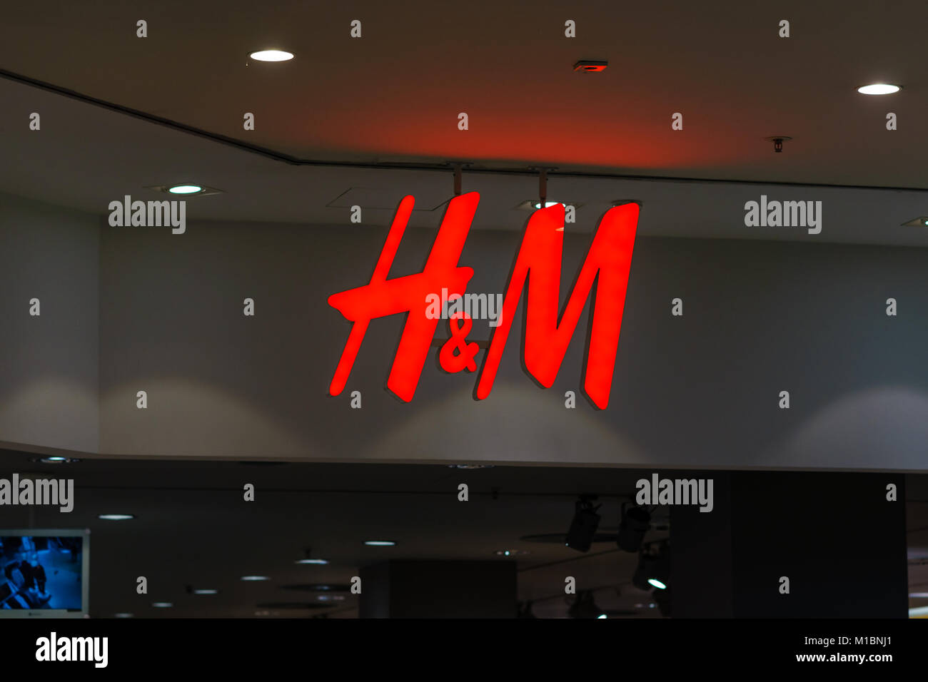 H&M logo in the Arkaden shopping mall at Potsdamer Platz. Hennes & Mauritz  AB (H&M) is a Swedish multinational retail-clothing company Stock Photo -  Alamy