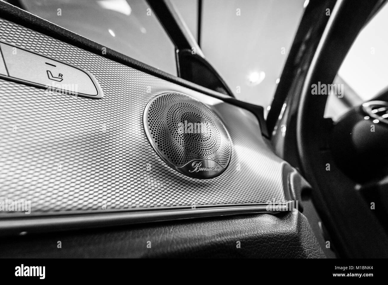 BERLIN - DECEMBER 21, 2017: Showroom. Speaker of the executive car Mercedes-Benz E-Class E220d (W213). Close-up. Black and white. Since 2017. Stock Photo