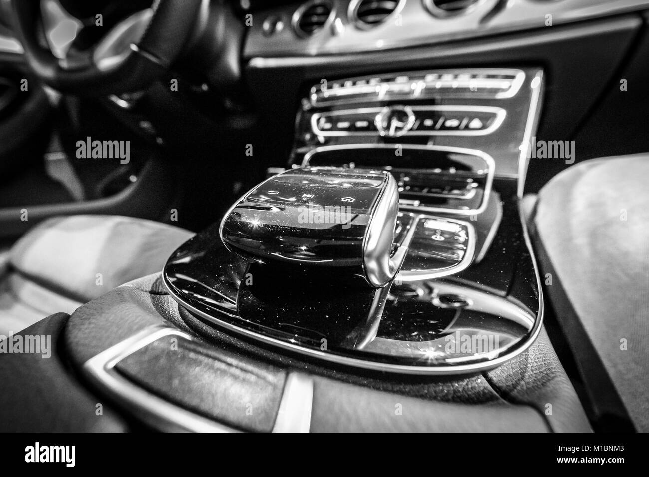 BERLIN - DECEMBER 21, 2017: Showroom. The shift knob of the executive car Mercedes-Benz E-Class E220d (W213). Close-up. Black and white. Since 2017. Stock Photo