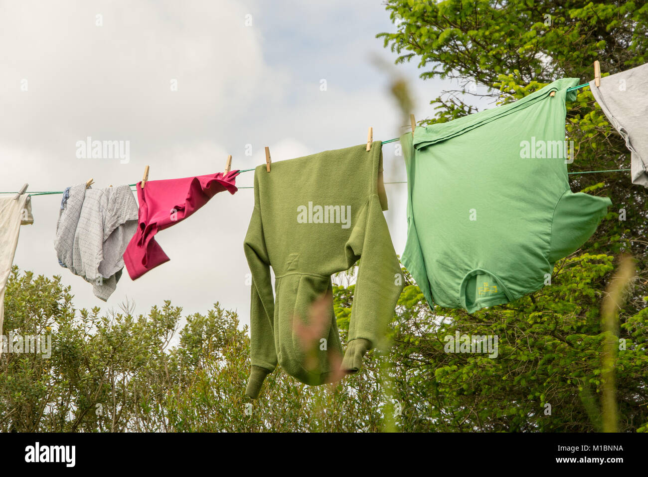 Laundry on lines outside Stock Photo Alamy