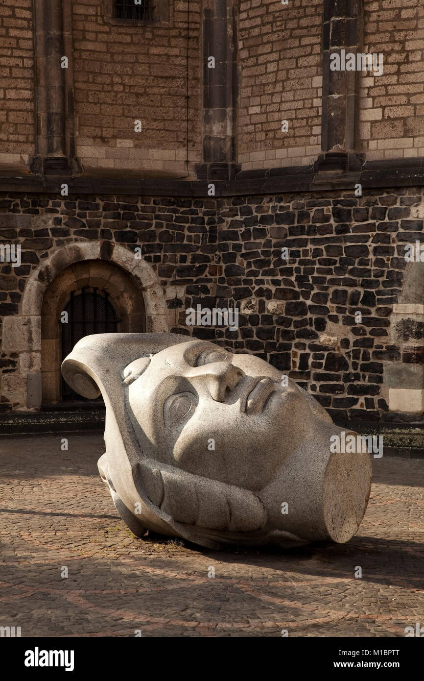 Granite head, stone sculpture Florentius and Cassius, in front of Bonn