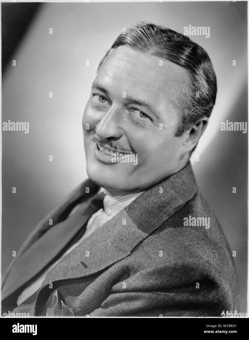 Edmund Lowe, Publicity Portrait for the Film, 'Under Cover of Night', MGM, 1937 Stock Photo