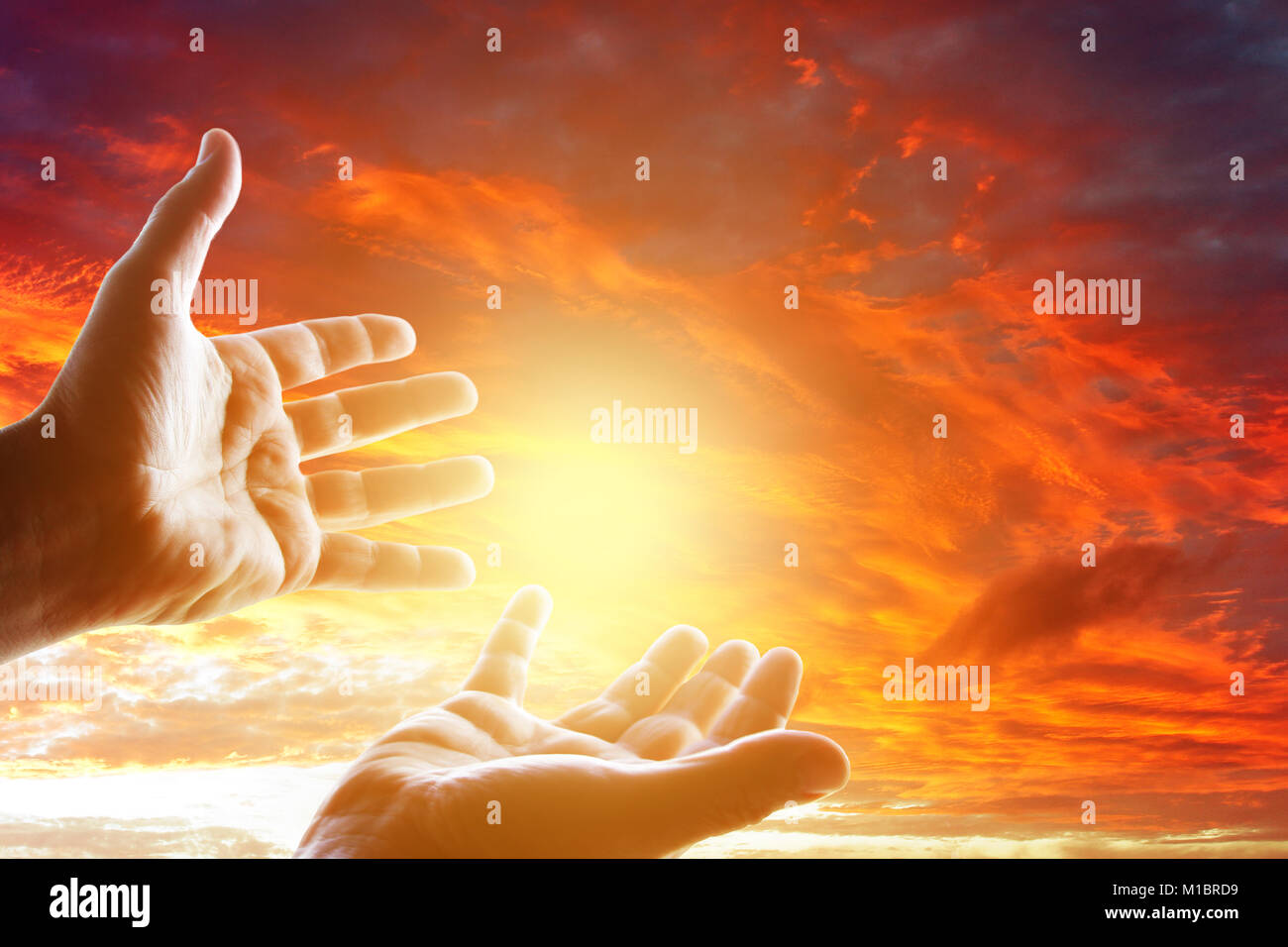 Hands reaching for the sky Stock Photo - Alamy