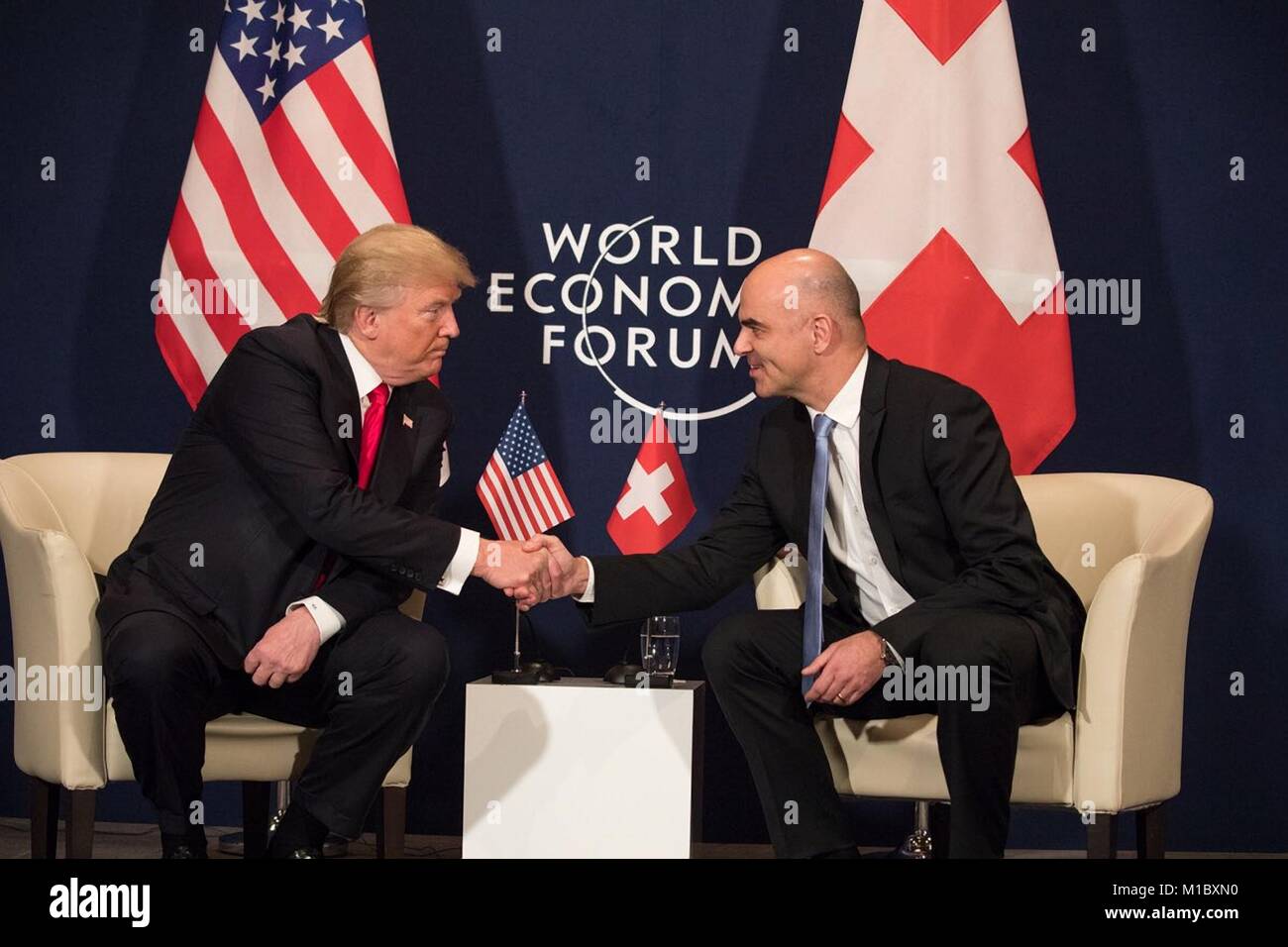 U.S President Donald Trump shakes hands with Swiss President Alain Berset, right, during a bilateral meeting on the sidelines of the World Economic Forum January 26, 2018 in Davos, Switzerland. Stock Photo