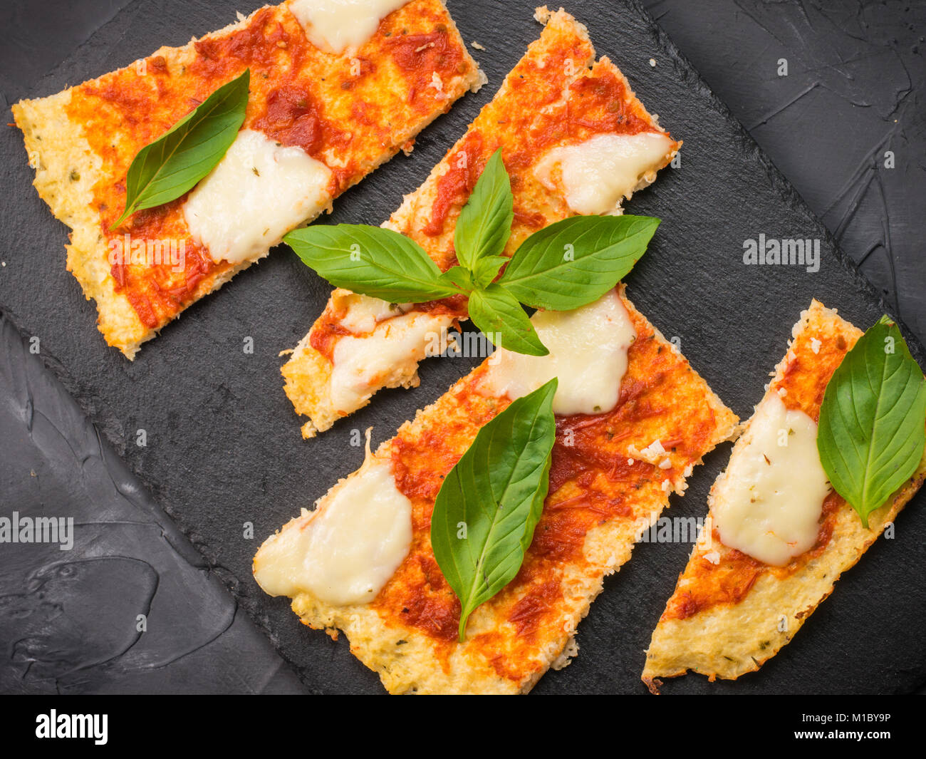 homemade cauliflower pizza crust with mozarella Stock Photo