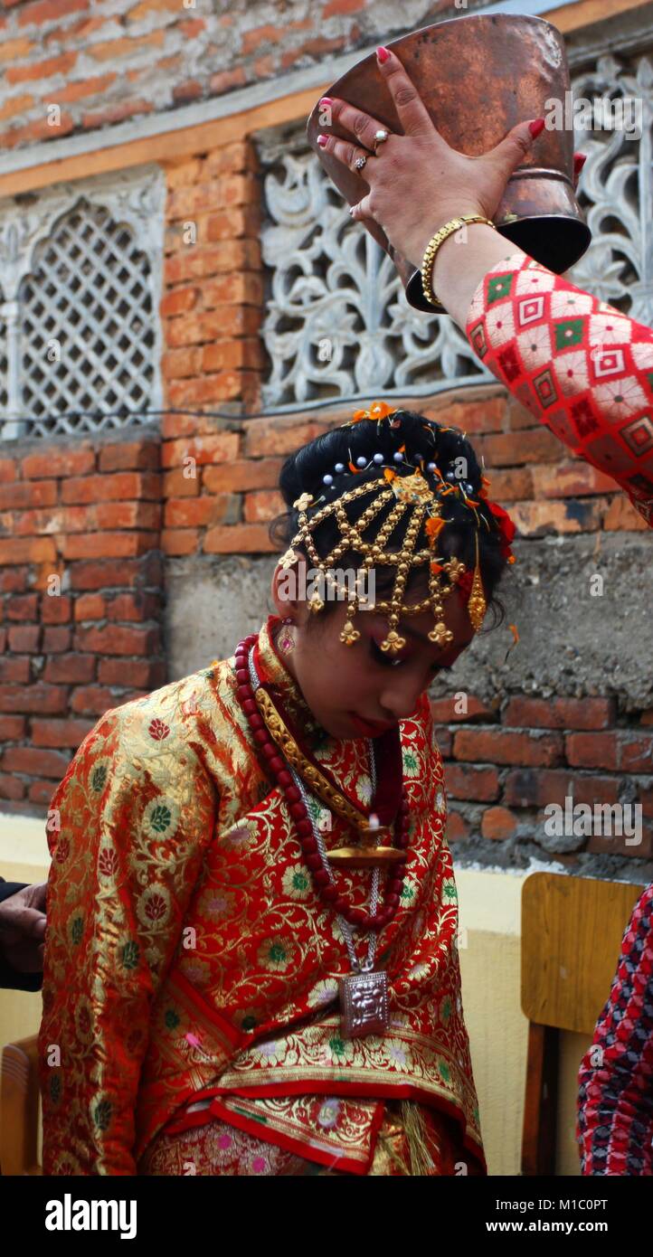 Kathmandu, Nepal. 29th Jan, 2018. Past living Goddess Kumari is going through a traditional process during a hindu ritual for girls named gupha nikaleko in Kathmandu, Nepal. Nepalese Hindu girls pass through a tradition of marrying Sun God before puberty by staying inside a room without sunlight for 12 days and then coming out for a meeting with Him in a function symbolizing a celestial marriage ceremony. Credit: Archana Shrestha/Pacific Press/Alamy Live News Stock Photo