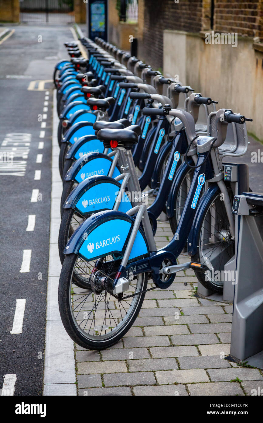 LONDON, UK - NOVEMBER 10, 2012: Row of Blue bikes used in a public bicycle hire scheme Barclays Cycle Hire also known as Boris Bikes Stock Photo