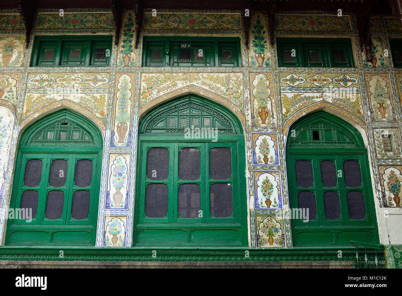 Detail of decorating the wall in a green uniquely wooden mosque, Shah E Hamdan in Srinagar, Jammu and Kashmir Stock Photo