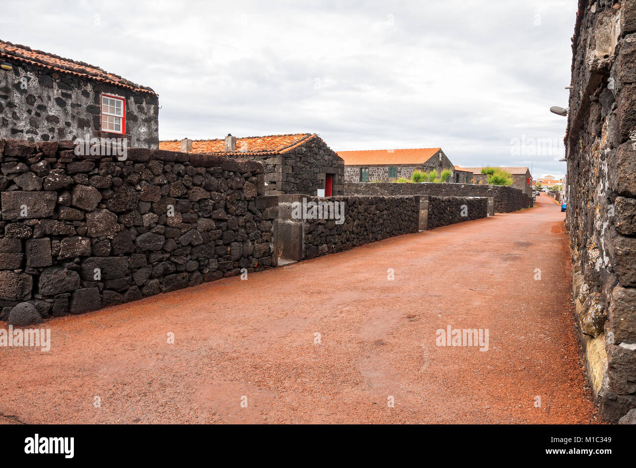 Traditional village on the island of Pico with houses made of volcanic stone, Azores Stock Photo