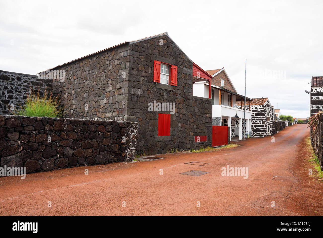 Traditional village on the island Pico with houses made of volcanic stone, Azores Stock Photo