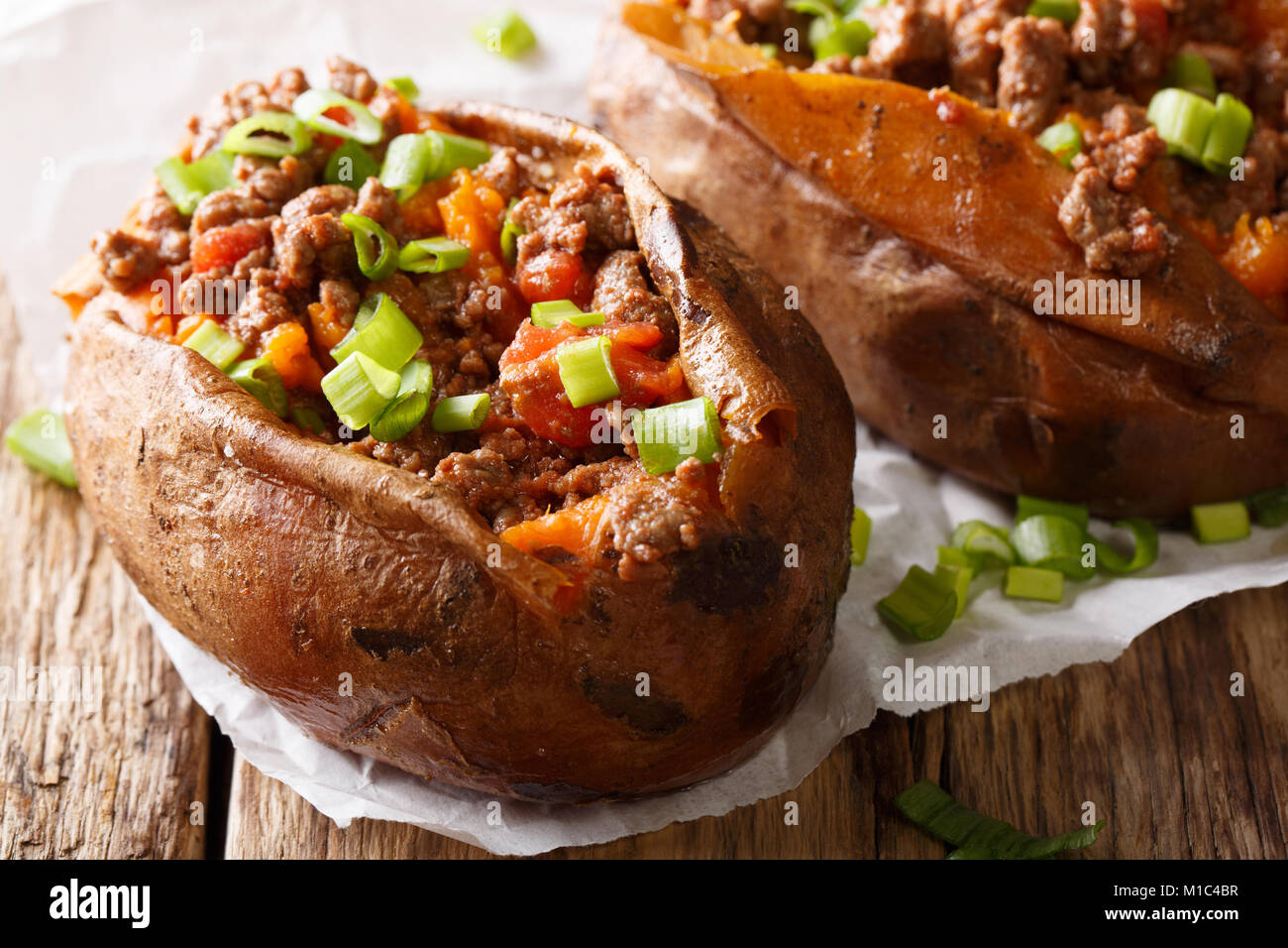 Healthy and tasty food baked sweet potato stuffed with ground beef and