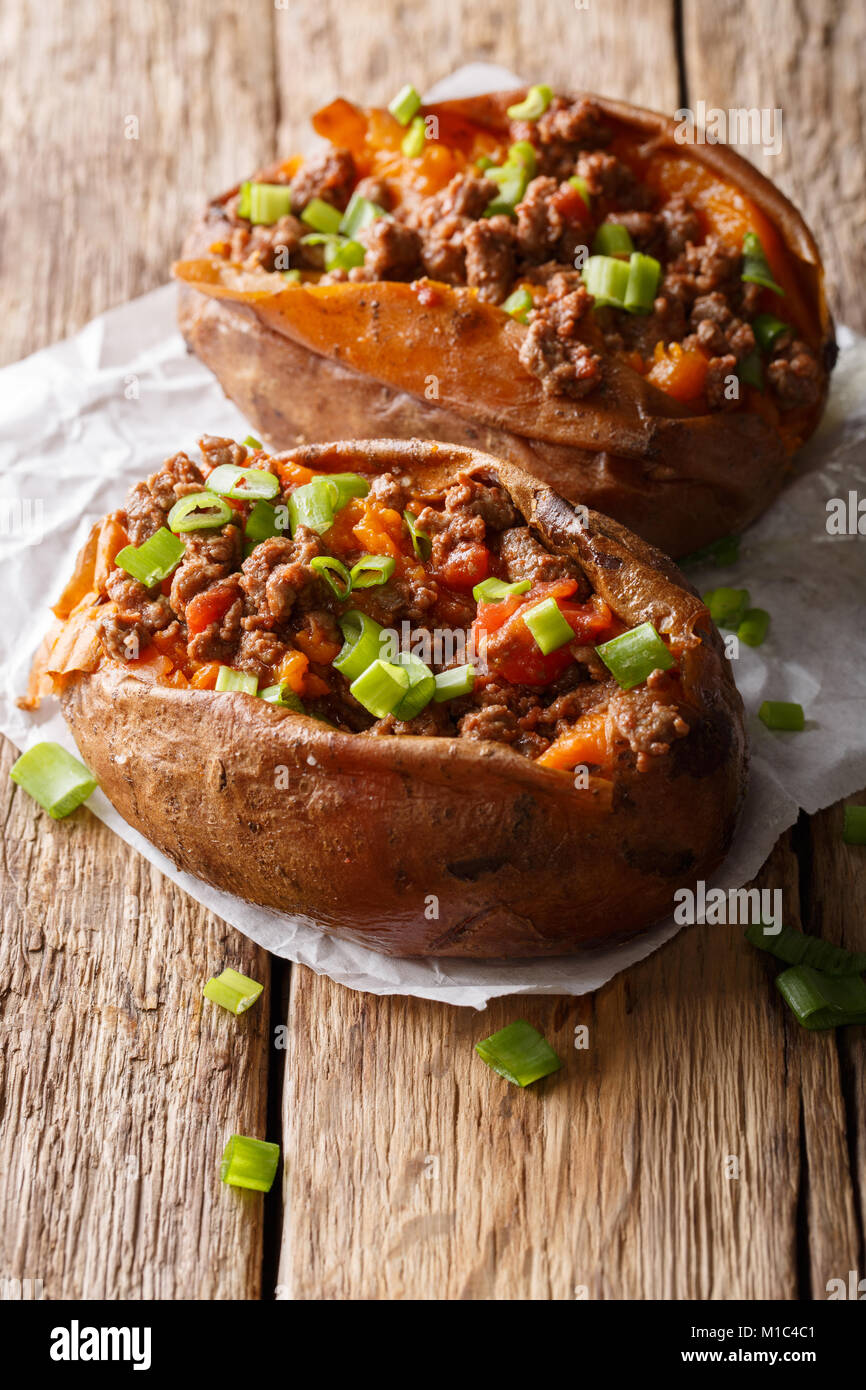 Delicious baked sweet potato stuffed with ground beef and green onion