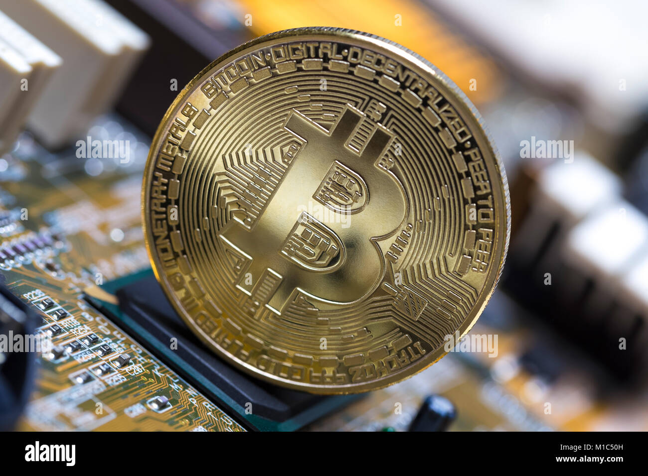 bitcoin on an computer motherboard Stock Photo - Alamy