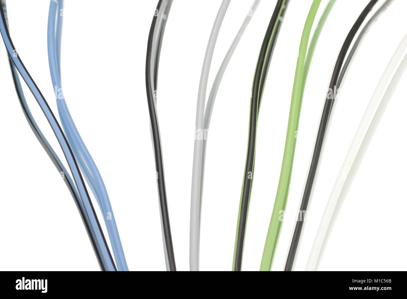Simple colorful cables against white background with reflection Stock Photo