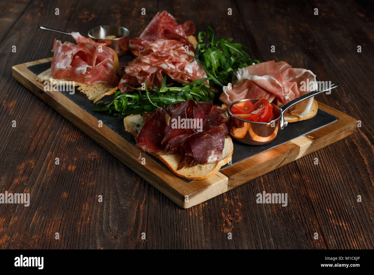 Assorted Deli Cold Meats on a plate. Stock Photo