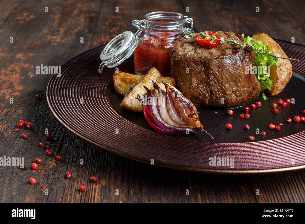 steak medallion. restaurant food. wood background Stock Photo - Alamy