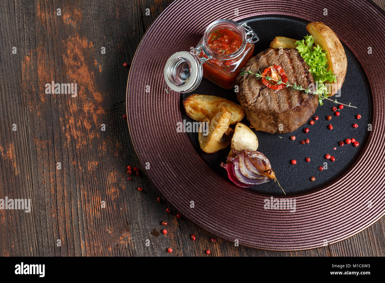 steak medallion. restaurant food. wood background Stock Photo - Alamy