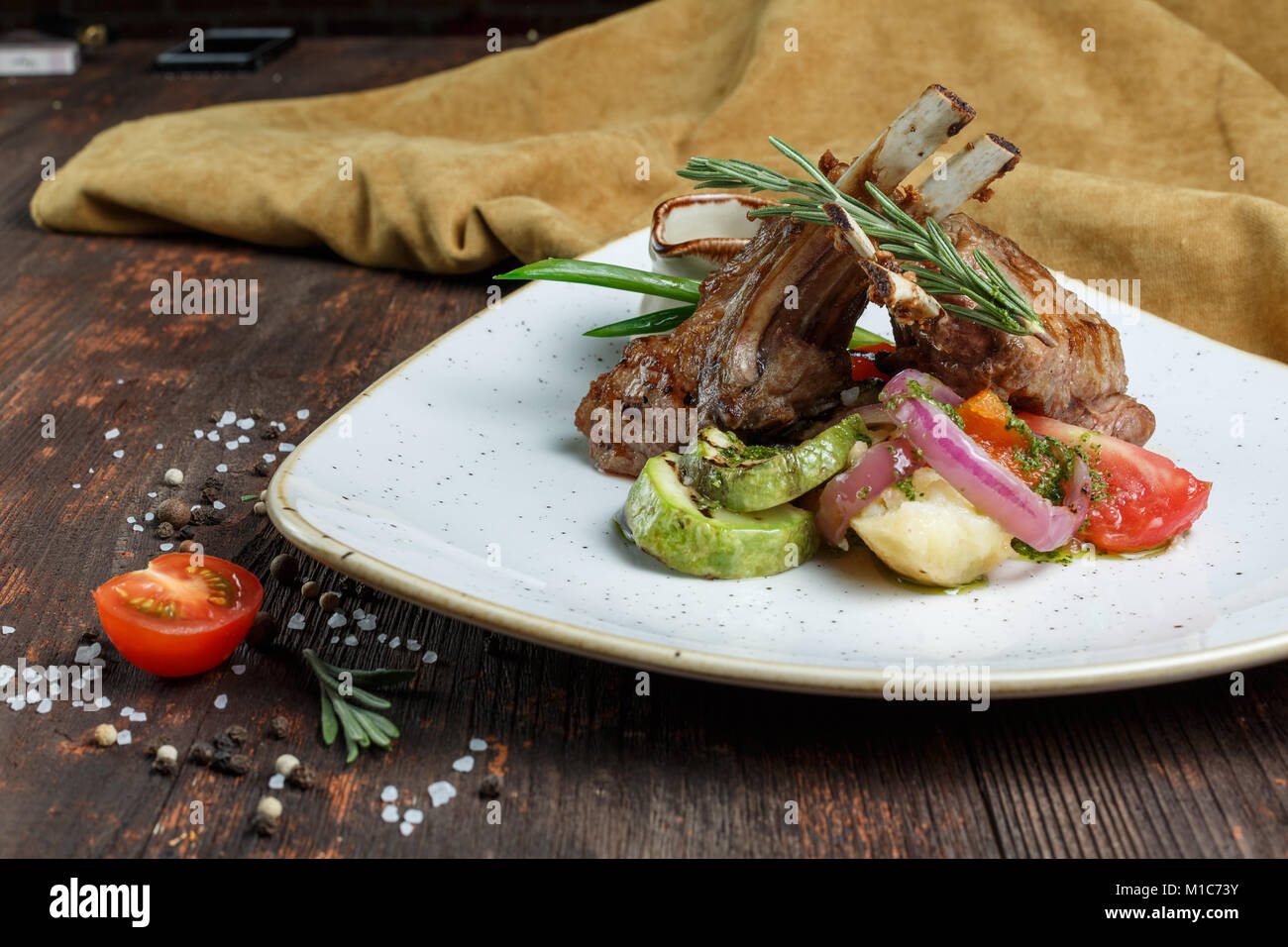 lamb ribs, rustic lunch, lamb with vegetables, grilled meat Stock Photo ...