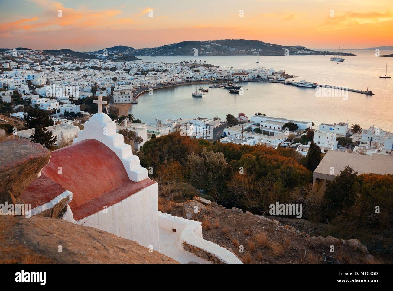 Mykonos bay viewed from above at sunset. Greece. Stock Photo