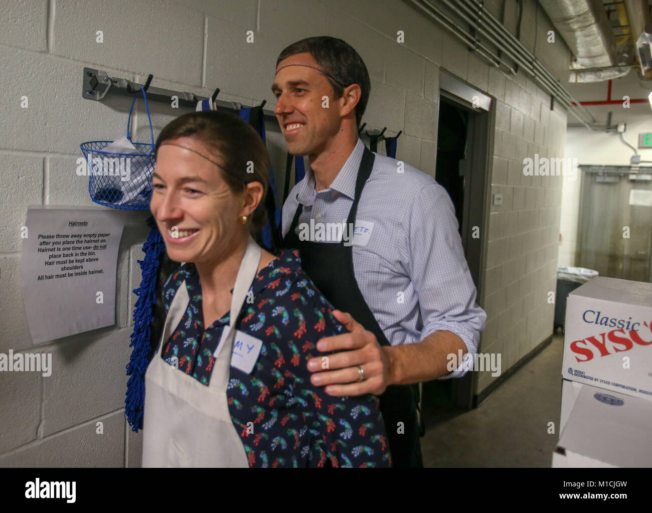 Houston, Texas, USA. 28th January, 2018. Beto O'Rourke, D-Texas and his wife Amy prepare to serve at The Beacon homeless shelter in Houston, TX. John Glaser/CSM/Alamy Live News Stock Photo