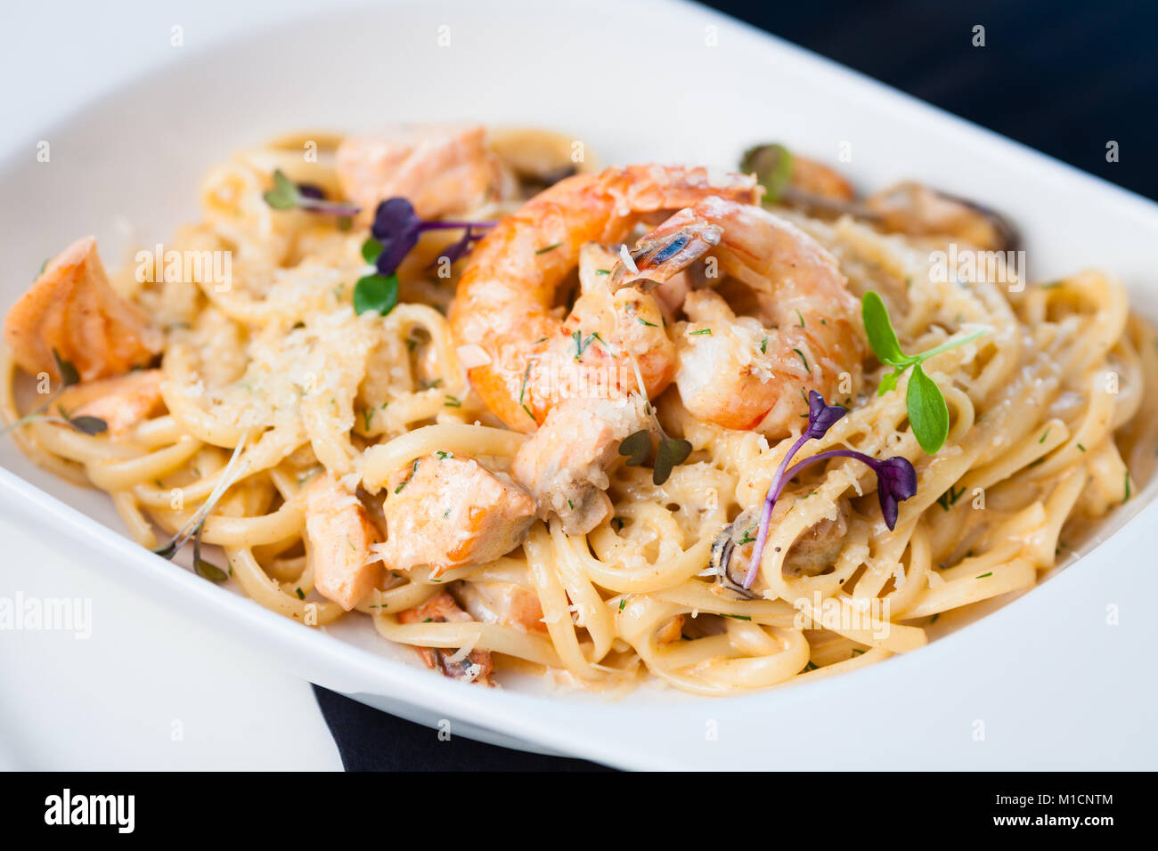 Creamy seafood pasta Stock Photo - Alamy