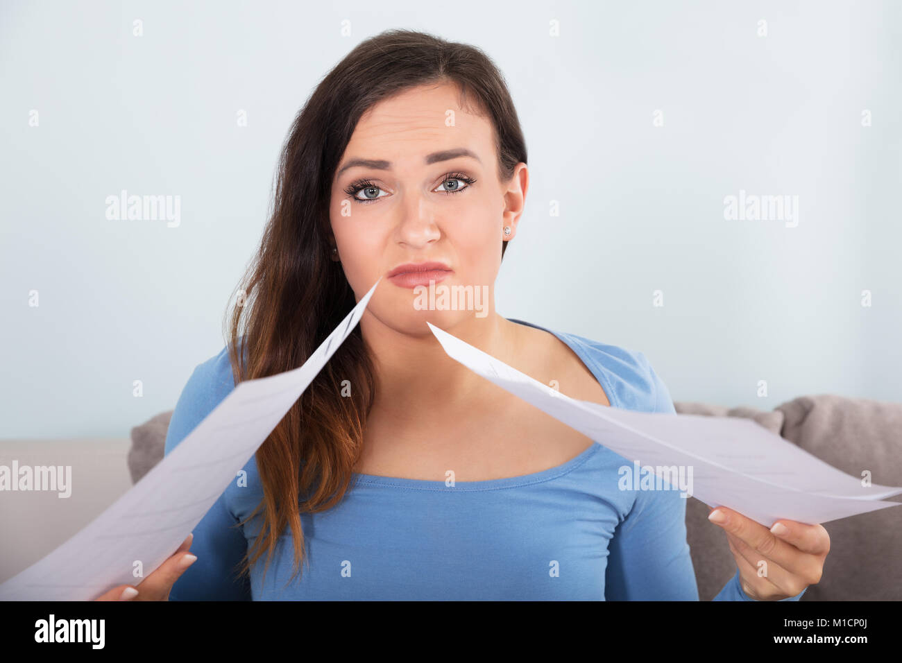 Woman confused unhappy choice hi-res stock photography and images - Alamy