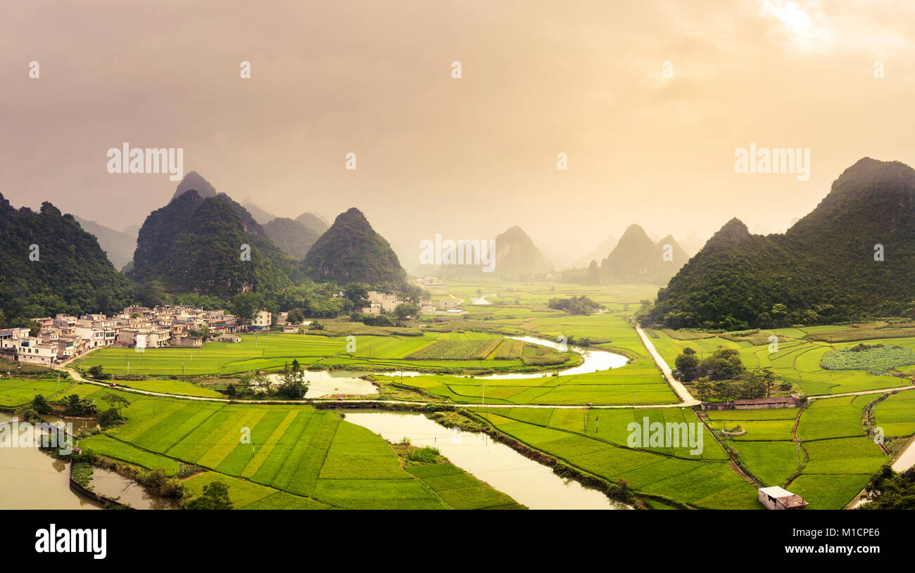 Stunning rice fields and karst formations scenery in Guangxi province of China Stock Photo