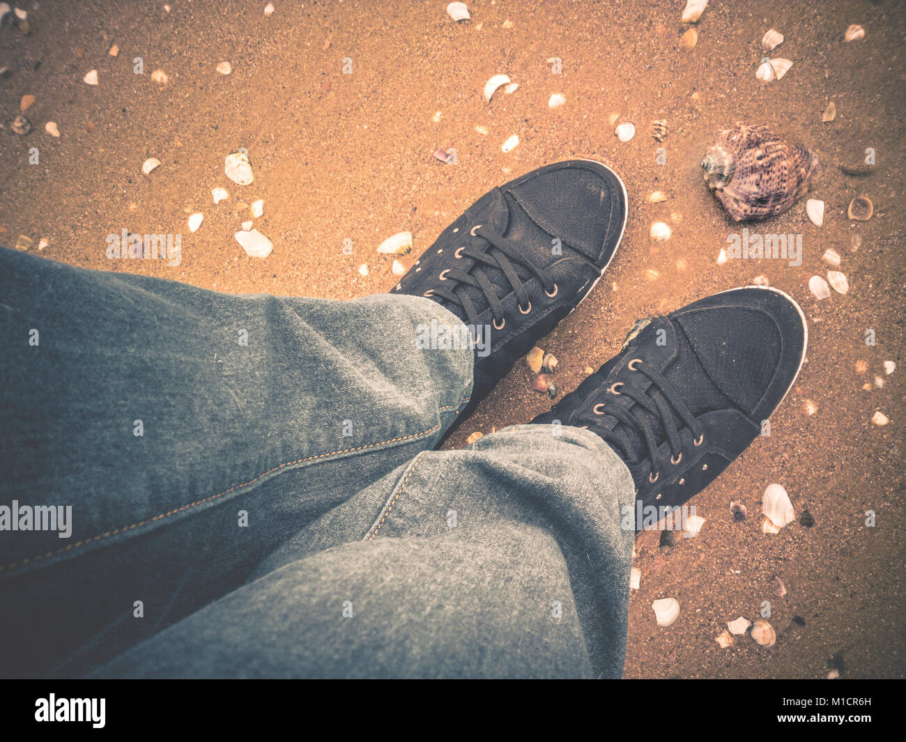 Woman wearing jeans beach hires stock photography and images Alamy