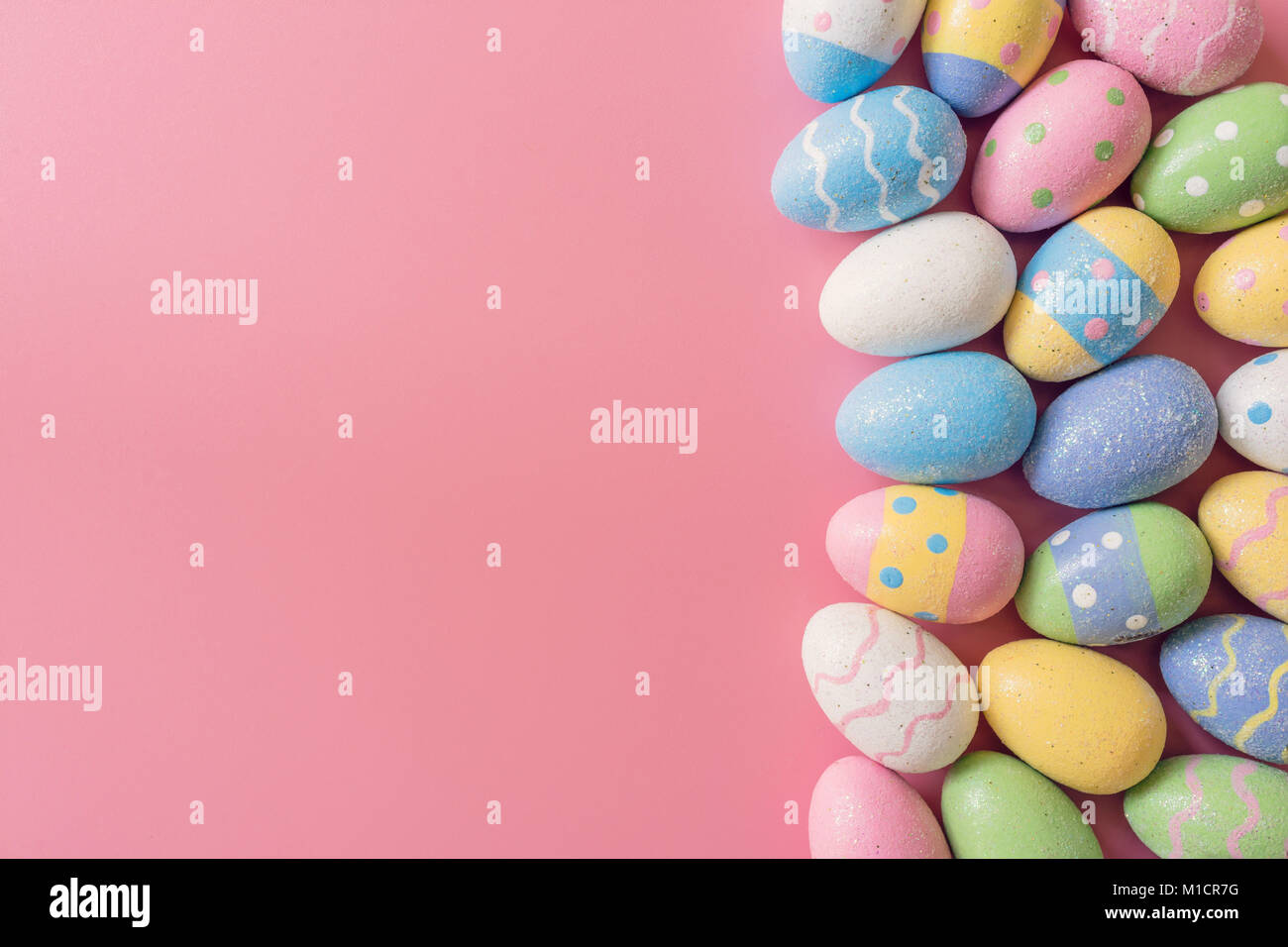 Colorful easter eggs on pink pastel color background with space Stock ...