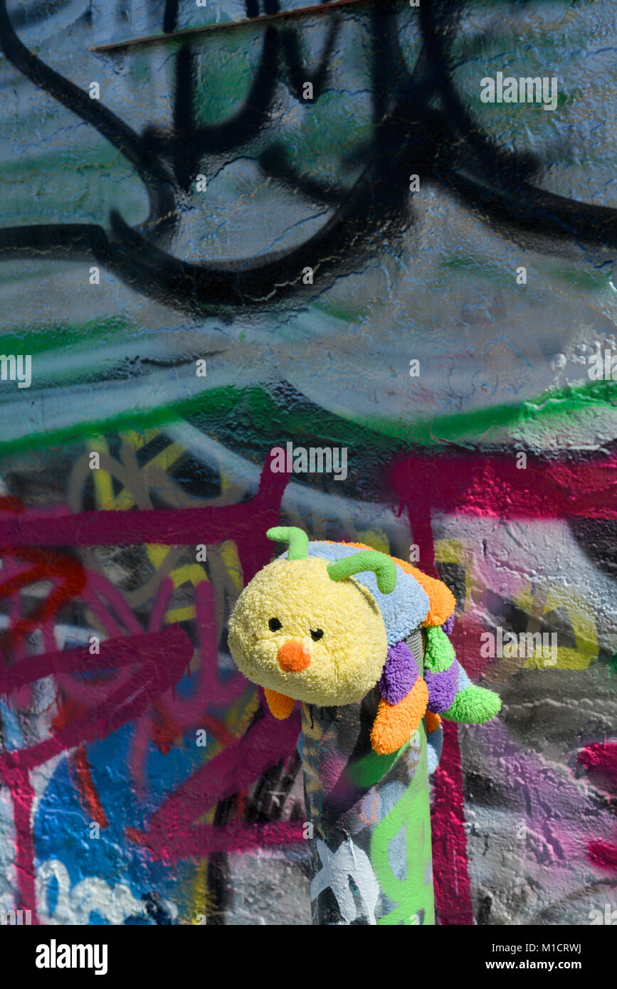 Colorful plushie toy in a graffiti area in downtown Las Vegas Stock Photo