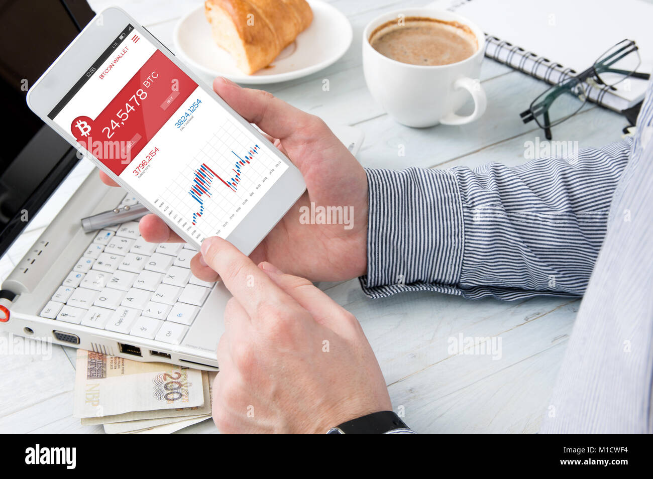 Man Checks Bitcoin Rate At Forex Market Application Smartphone - 