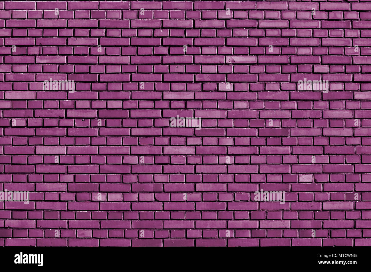 radiant orchid brick wall background Stock Photo