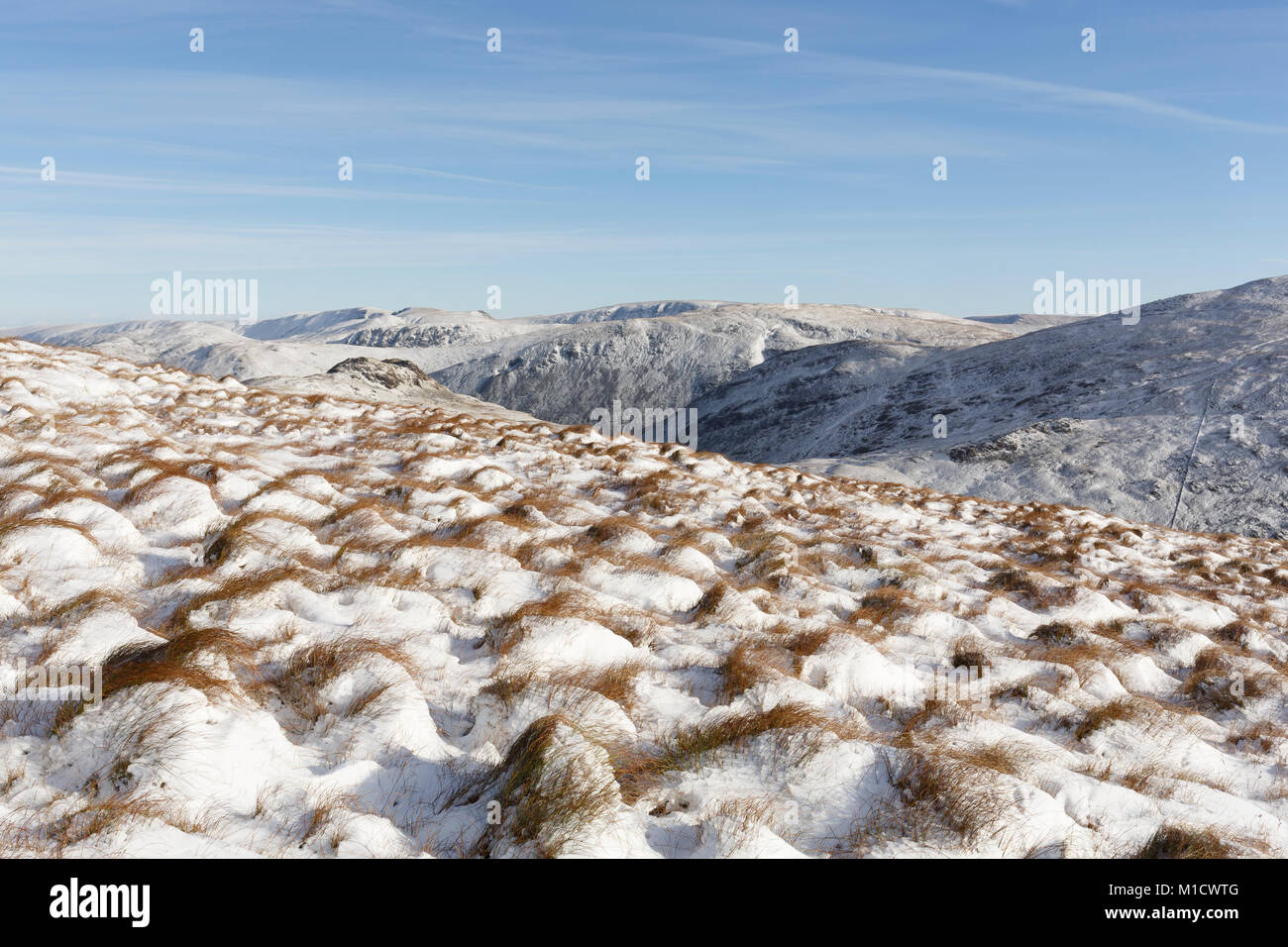 From Nr Fairfield, Lake District in winter. Looking to the north east fells Stock Photo