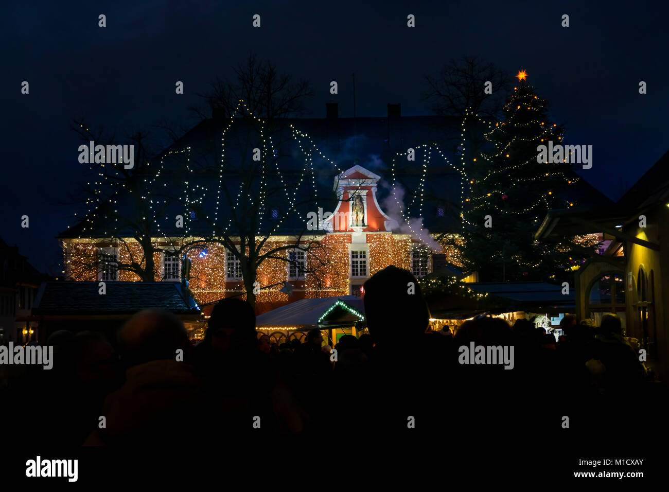 Christmas fair in Soest - illuminated Soester city hall Stock Photo