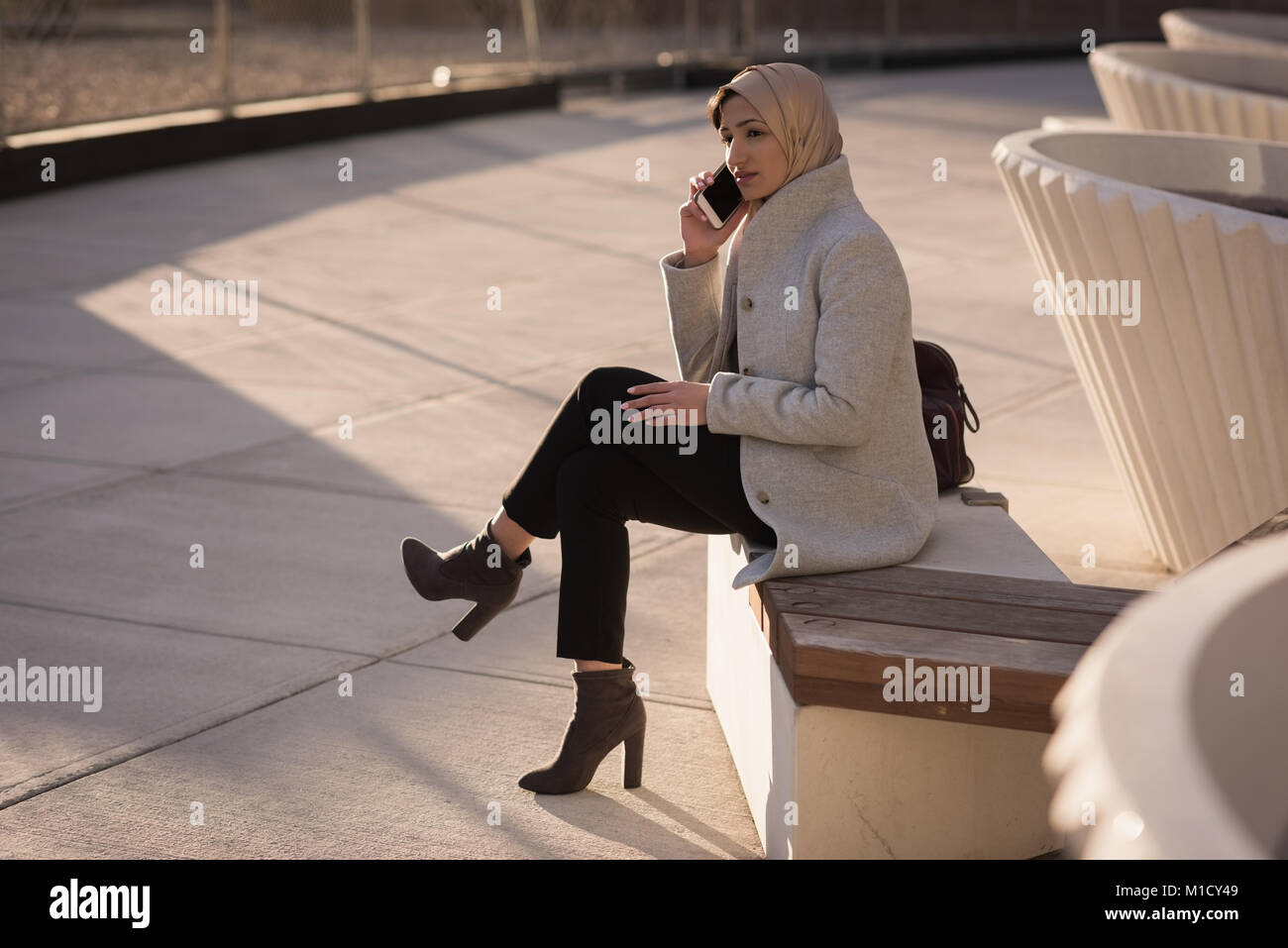 Woman in hijab talking on mobile phone Stock Photo