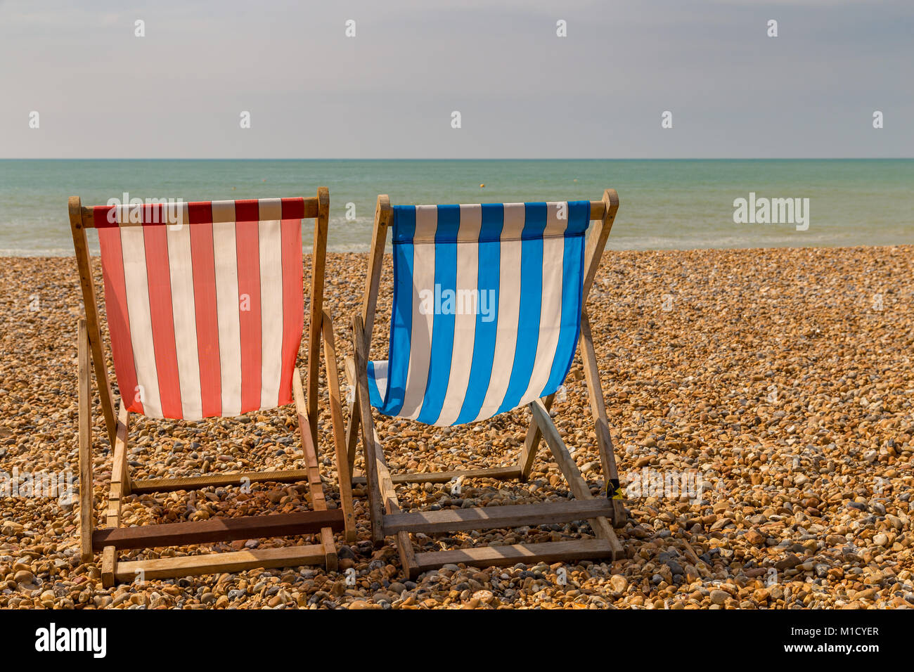 Empty deck chairs on beach hi-res stock photography and images - Alamy
