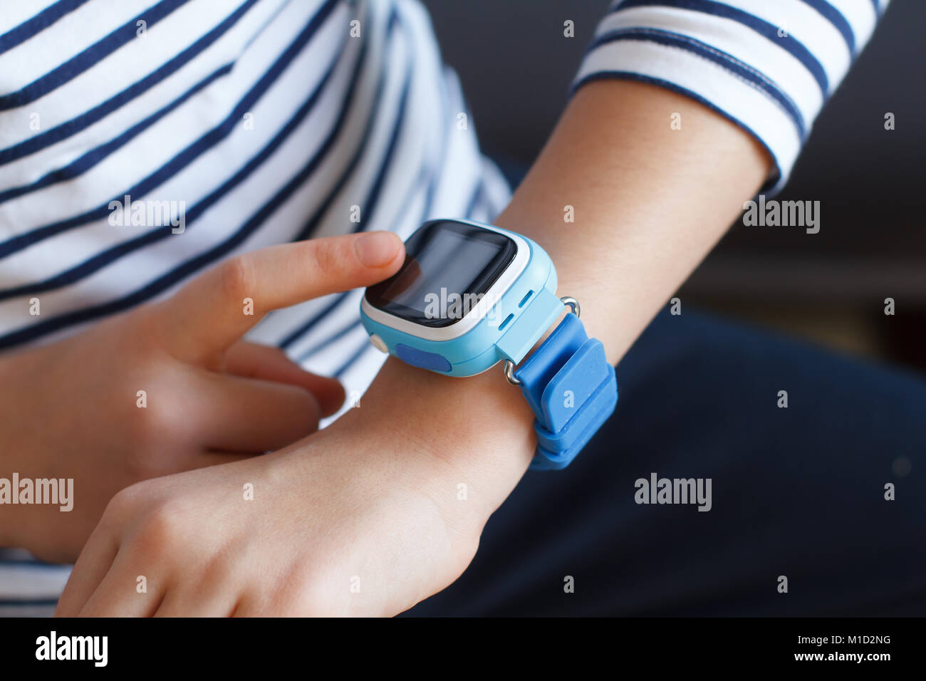 Schoolgirl uses smart watch phone to communicate with her parents