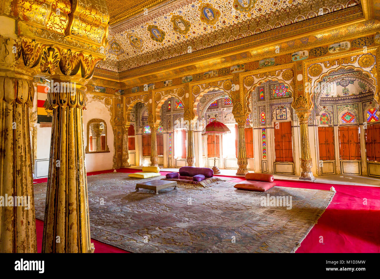 Mehrangarh Fort royal palace room interior with decoration and intricate artwork in gold and