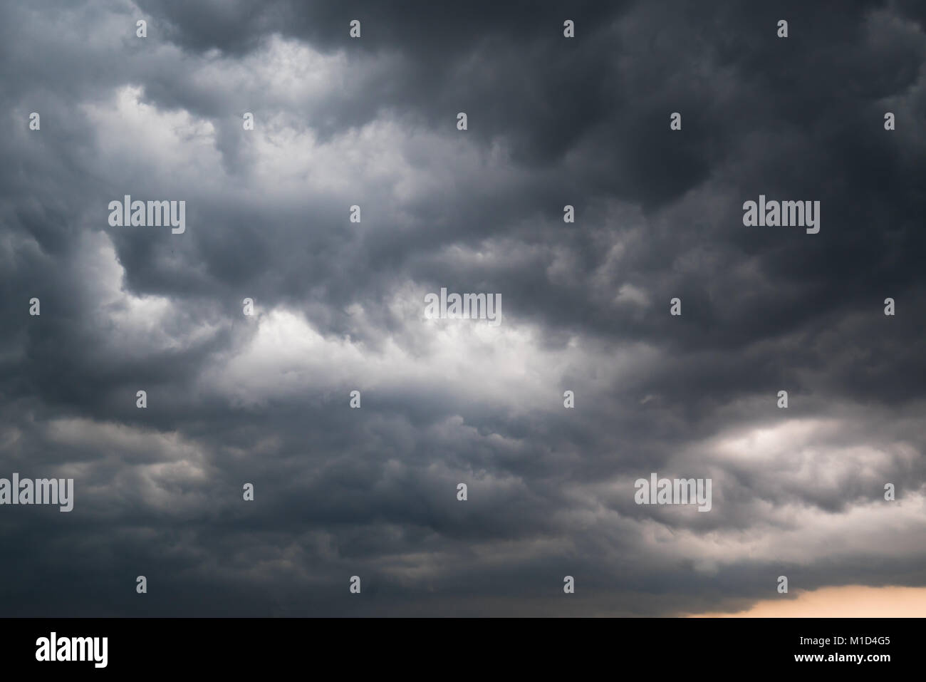 storm cloud background during raining. Dark Clouds. Huge black clouds ...