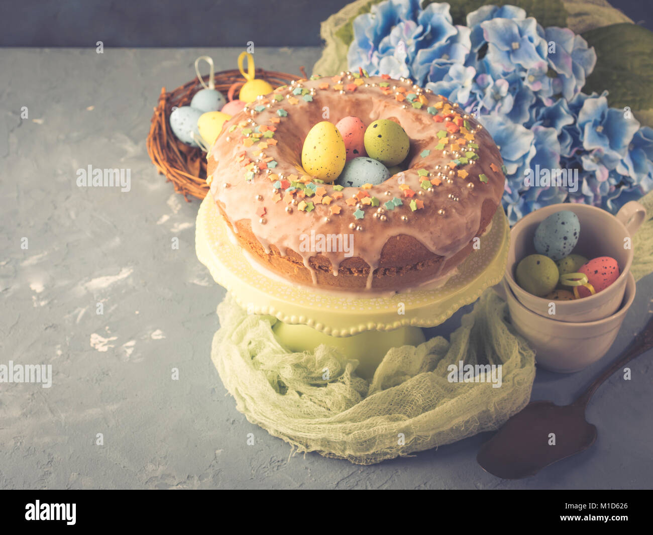 Easter bundt ring cake with sugar frosting sprinkles decorations eggs ...