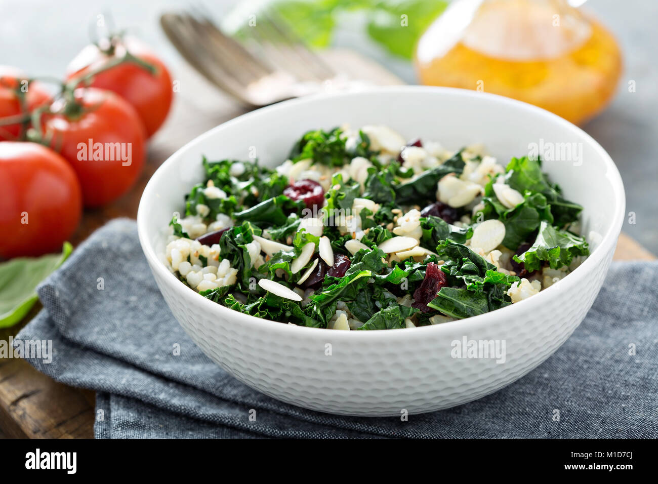Warm kale salad with brown rice and cranberry Stock Photo Alamy