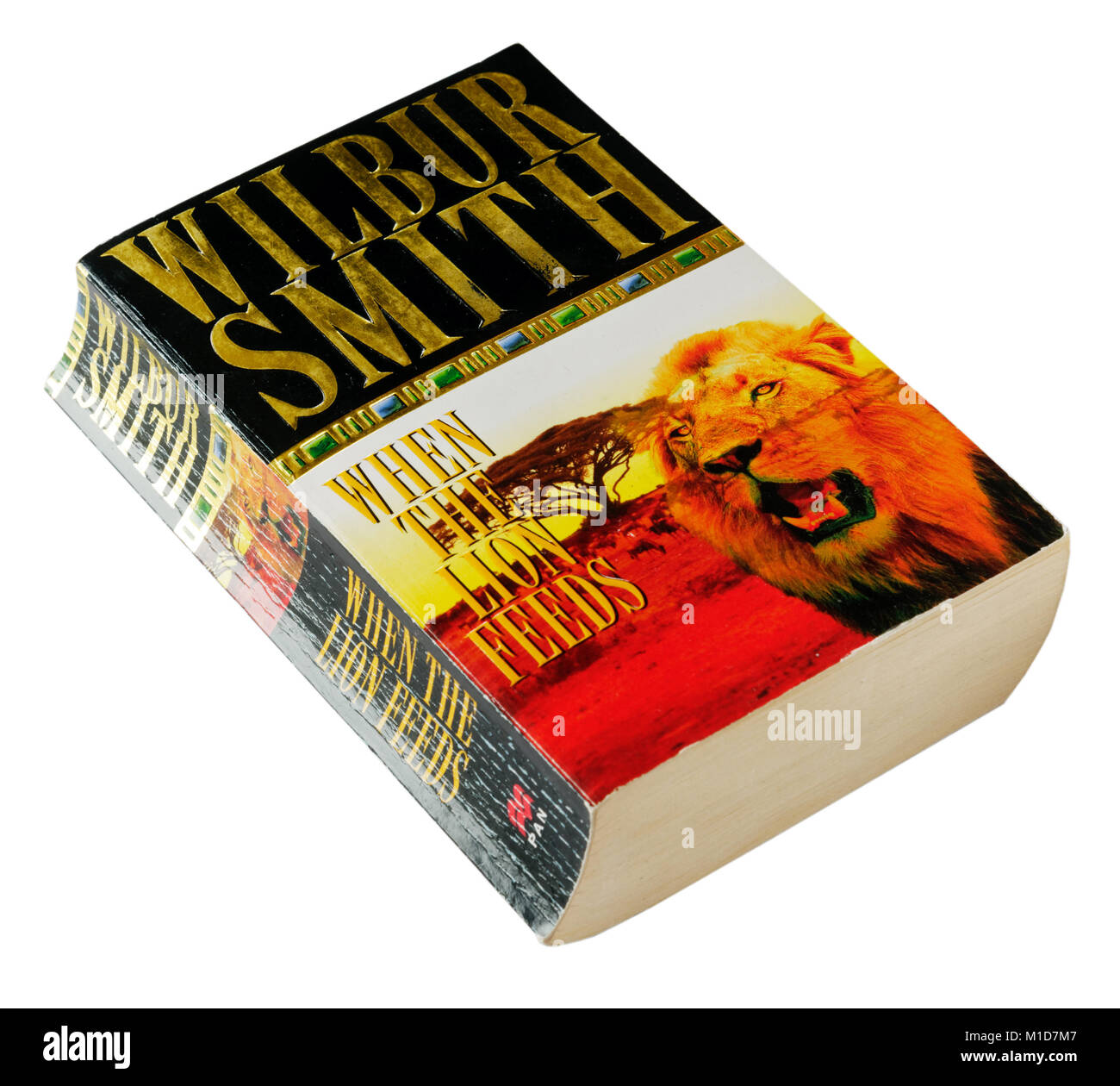 When the Lion Feeds byWilbur Smith Stock Photo