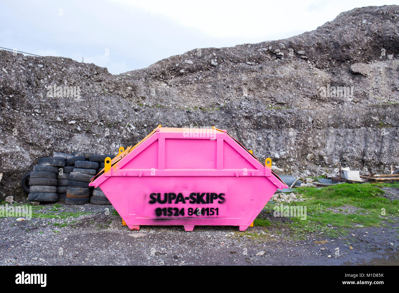 Skip rubbish container hires stock photography and images Alamy