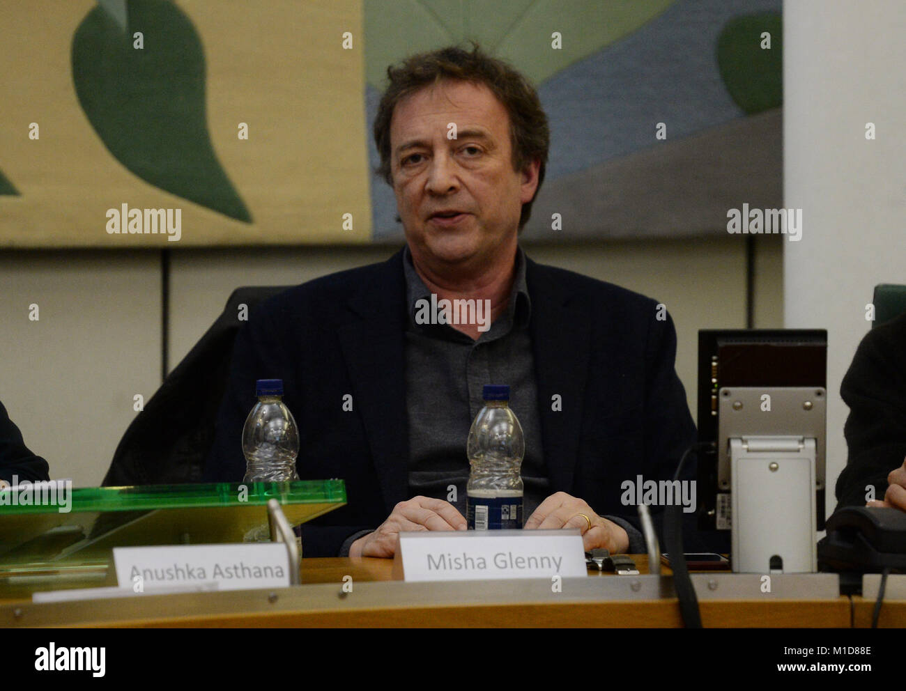 McMafia author Misha Glenny at an event held by anti-corruption NGO Global Witness at Portcullis House in Westminster, London, where new data analysis was launched detailing the number of anonymously owned properties in the UK. Stock Photo