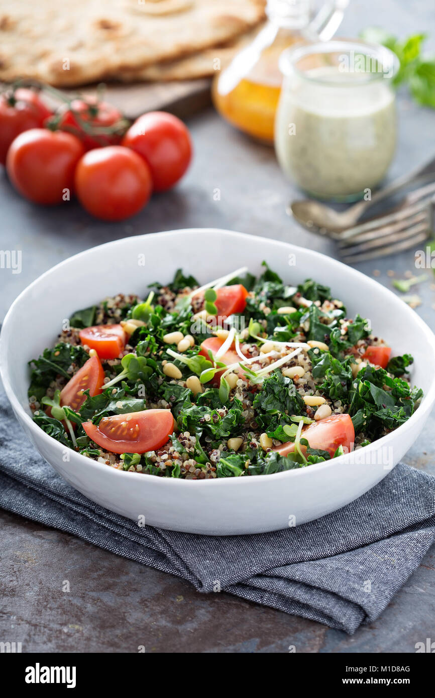 Kale and quinoa salad with tomatoes Stock Photo Alamy