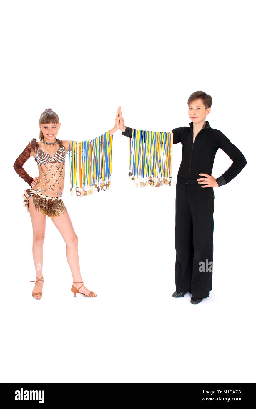 Many gold, silver, and bronze medals winner ballroom dance boy and girl