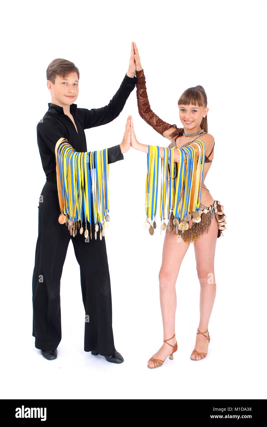Many gold, silver, and bronze medals winner ballroom dance boy and girl