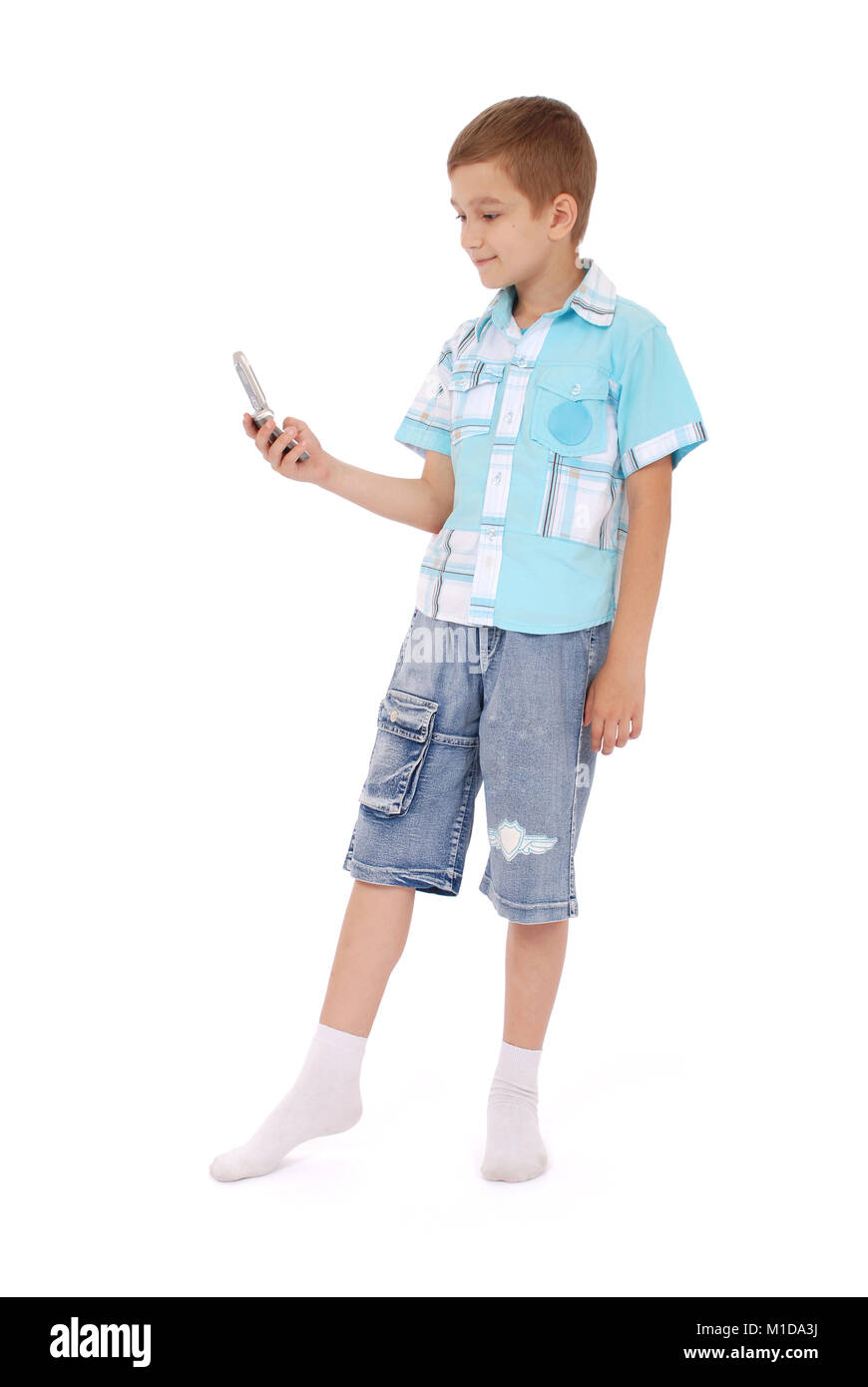 Boy Send Msg Young boy send text message with mobile phone Stock Photo - Alamy