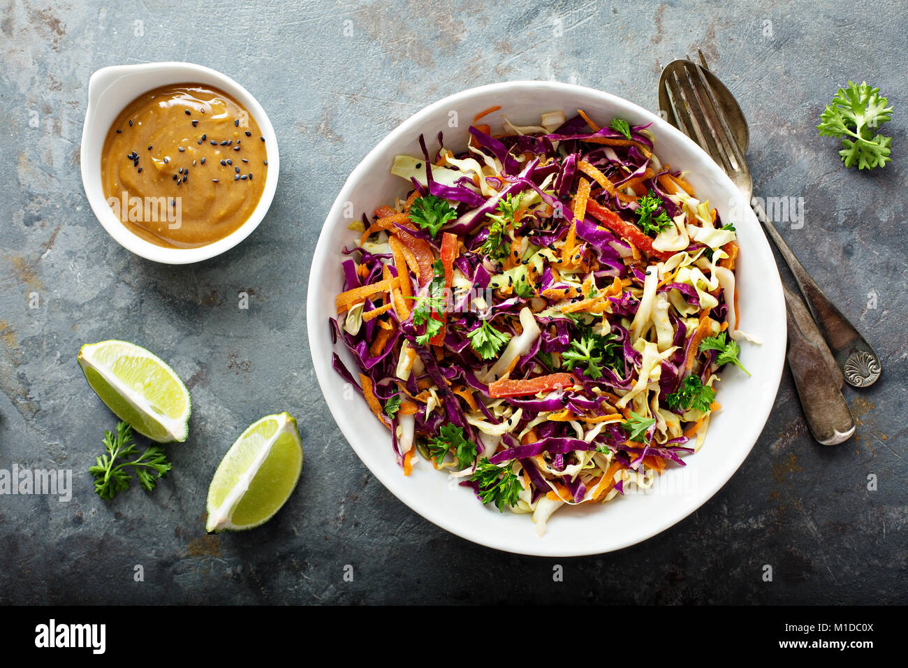 Asian cole slaw with peanut butter dressing Stock Photo