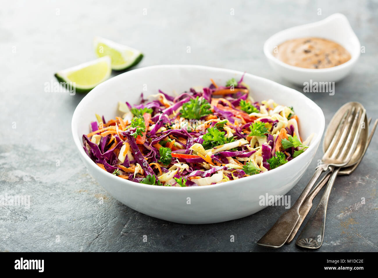 Asian cole slaw with peanut butter dressing Stock Photo Alamy